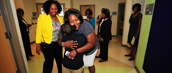 Chancellor Kaya Henderson greets a student at Ketcham Elementary School. Keep those smiles coming all year round!
