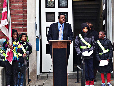 Students from the Garfield safety patrol stand outside.