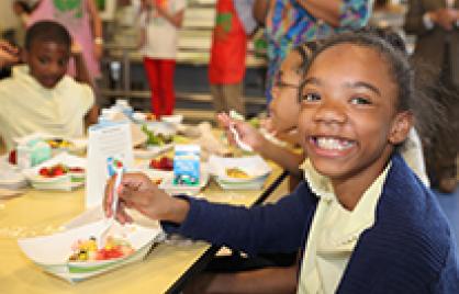 Young student eating lunch