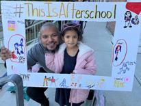 Photo of child and adult at afterschool Photo of child and adult at afterschool