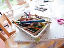 Donate school supplies Photo of school supplies on classroom table