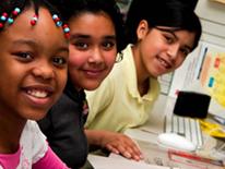 Photo of young girls in computer lab