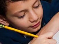 A young student doing schoolwork